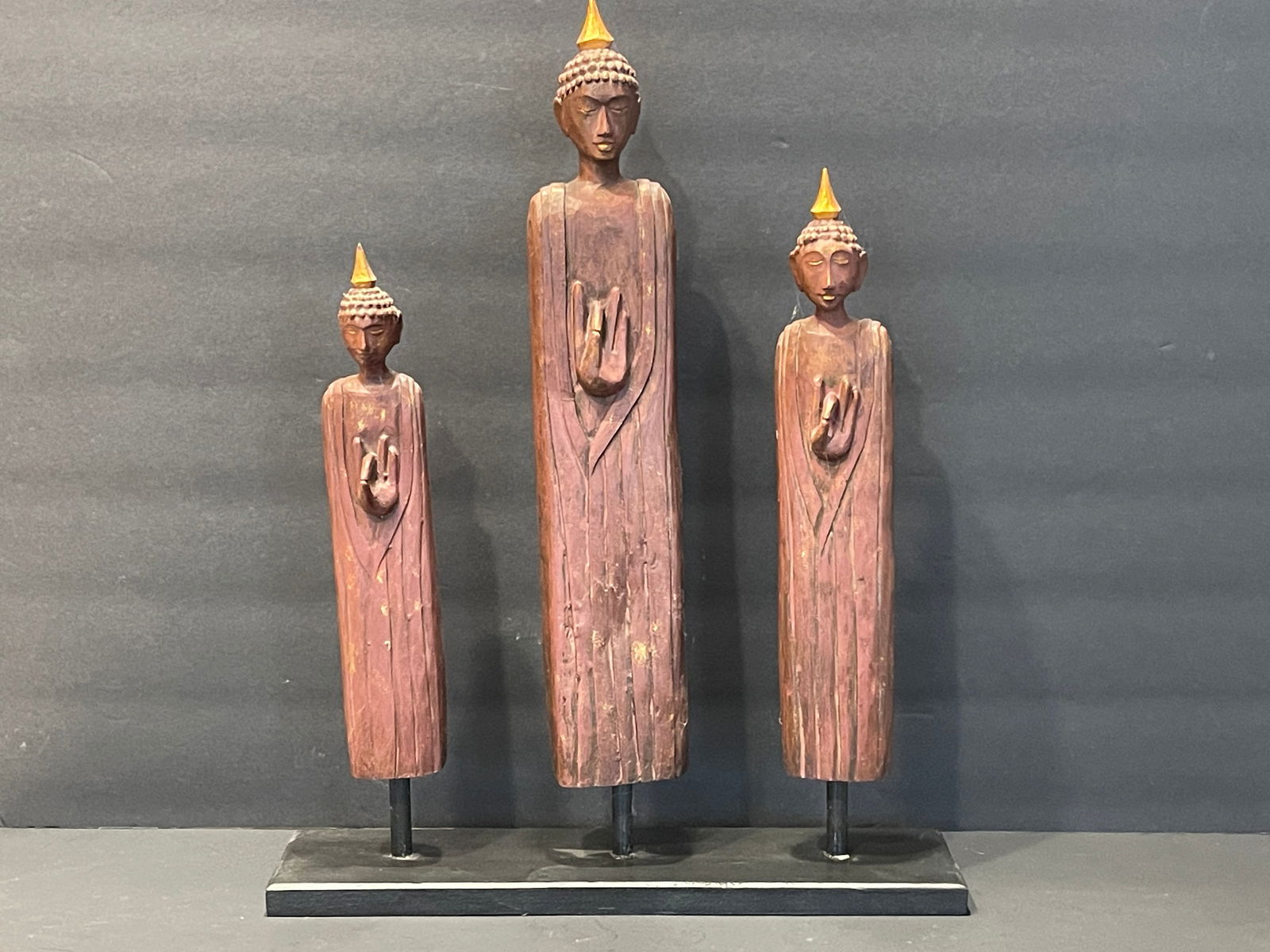 THREE CARVED WOODEN ASIAN FIGURES (1 of 2)