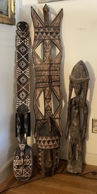 THREE CARVED TRIBAL FIGURES