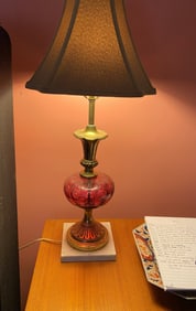 PAIR OF TALL GLASS LAMPS ON MARBLE