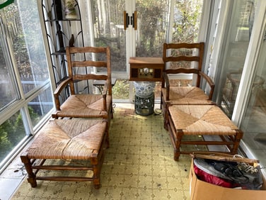 TWO LARGE HARDWOOD ARMCHAIRS WITH OTTOMANS WICKER SPLINT SEAT
