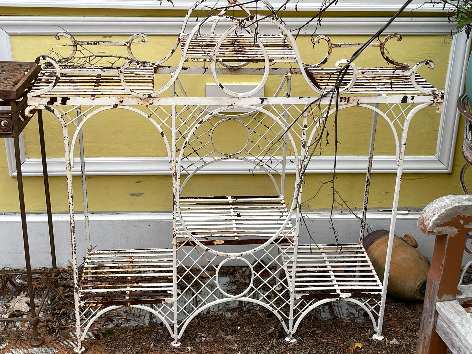 PAINTED IRON STEP TIERED POTTERY SHELF 42 X 12 X 38: PAINTED IRON STEP TIERED POTTERY SHELF 42 X 12 X 38