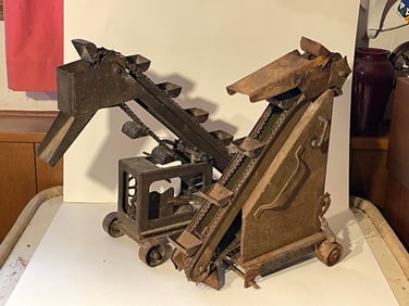 TWO EARLY IRON TOYS AS IS