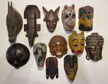 TWELVE MISC. CARVED, PAINTED MASKS