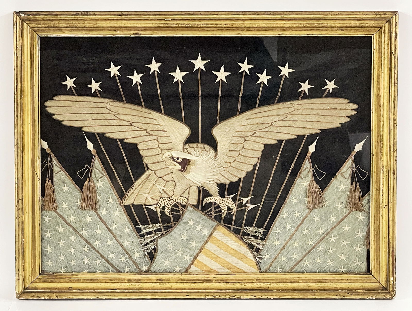 Antique framed silk work embroidery of an eagle with stars