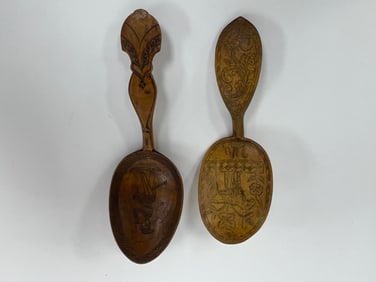TWO SMALL CARVED SPOONS 1 DATED