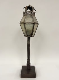 UNUSUAL SHEET IRON LANTERN ON OLD WOODEN BASE