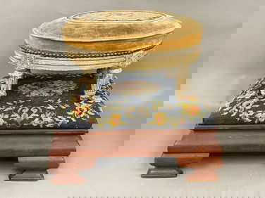 TWO UPHOLSTERED FLOOR STOOLS , FRENCH AND AMERICAN