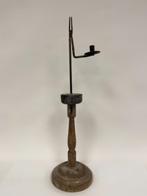 FORGED IRON CANDLESTICK ON EARLY PAINT DECORATED BASE