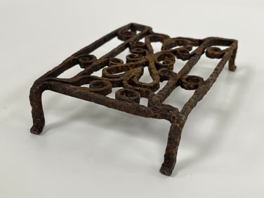 EARLY RECTANGULAR FOUR FOOTED DOUBLE HEART FORGED IRON TRIVET