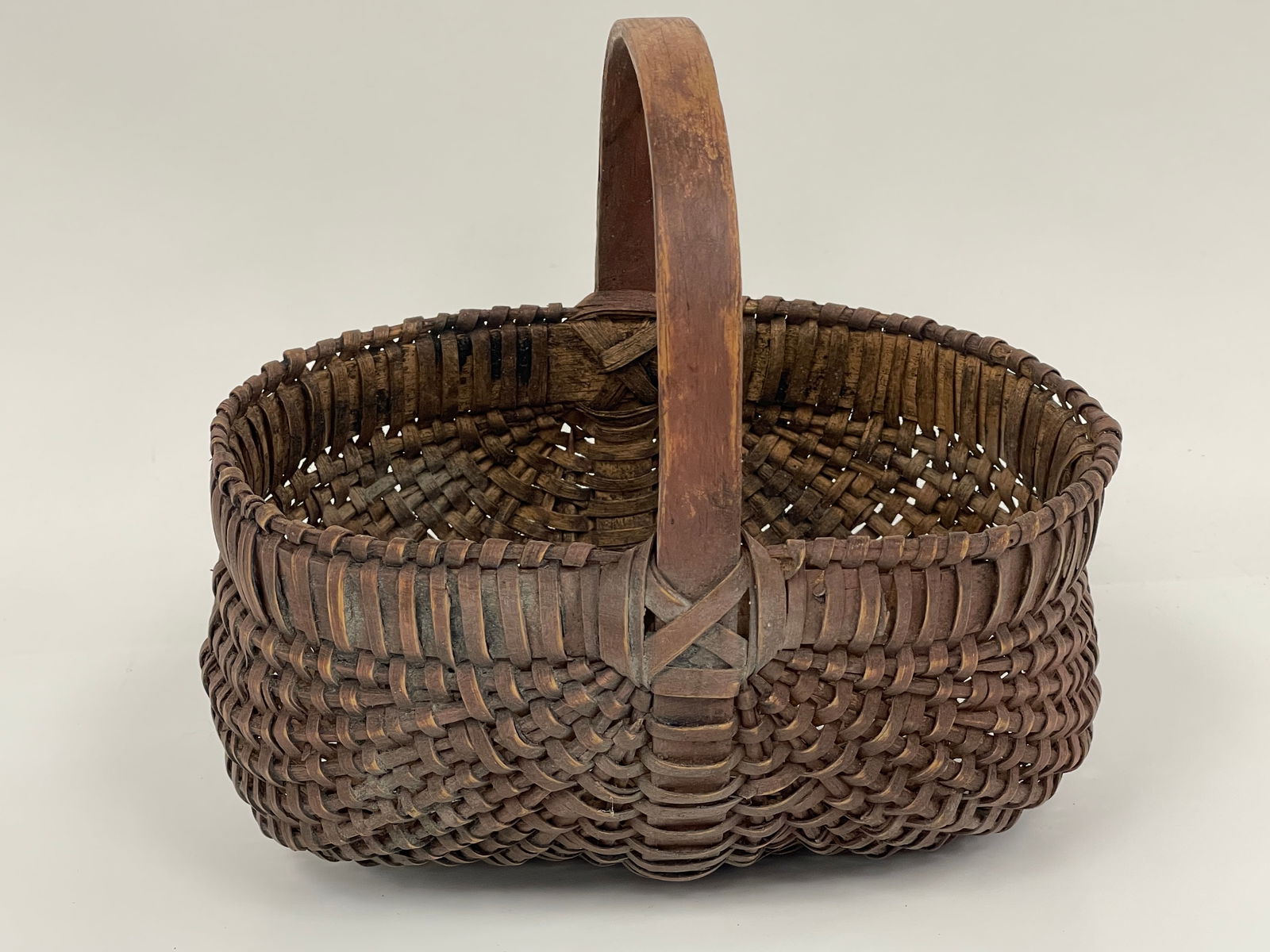 SMALL BUTTOCKS BASKET IN CINNAMON RUST COLOR (1 of 5)