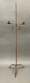 QUEEN ANNE BASE FLOOR STANDING BLACKSMITH MADE LIGHTING DEVICE W/ PAIR OF ADJUSTABLE CANDLE CUPS