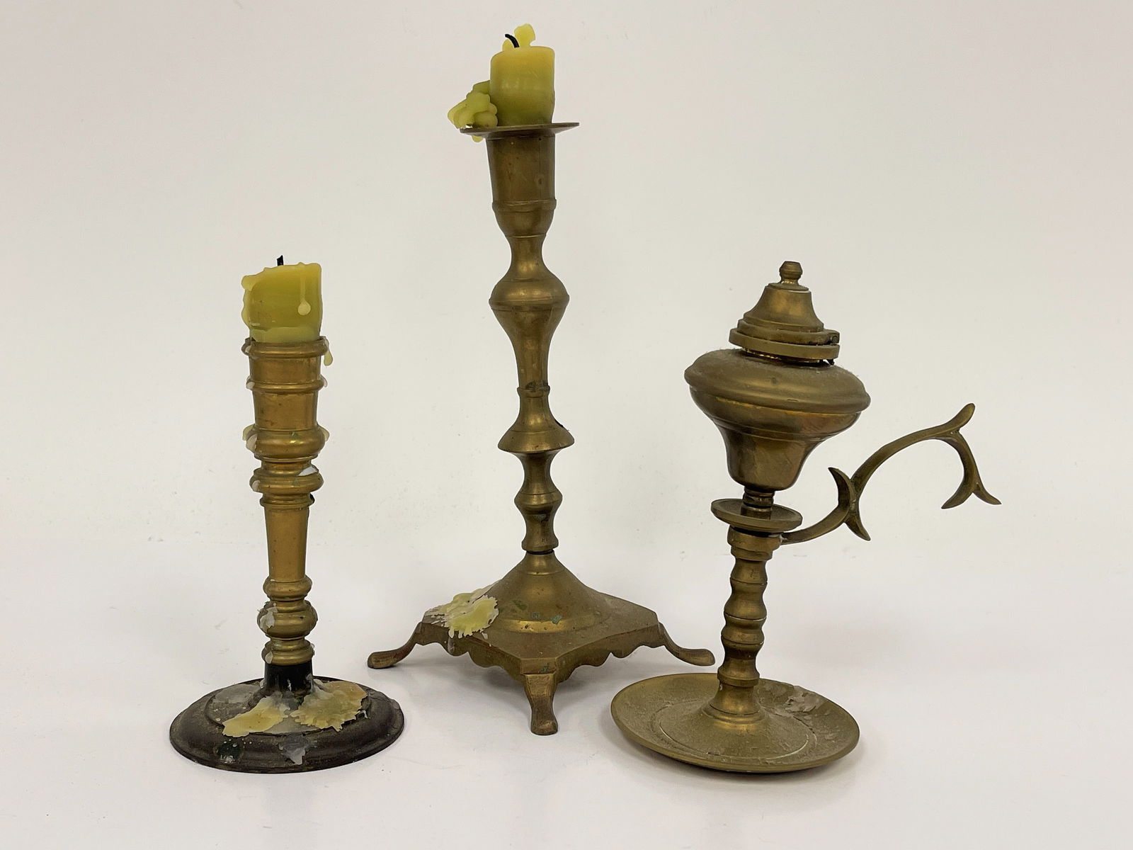 THREE BRASS CANDLESTICKS 7": THREE BRASS CANDLESTICKS 7"