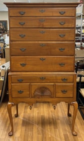 A maple Queen Anne highboy with carved shell