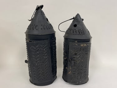 TWO EARLY PIERCED TIN PAUL REVERE LANTERNS IN BLACK PAINT