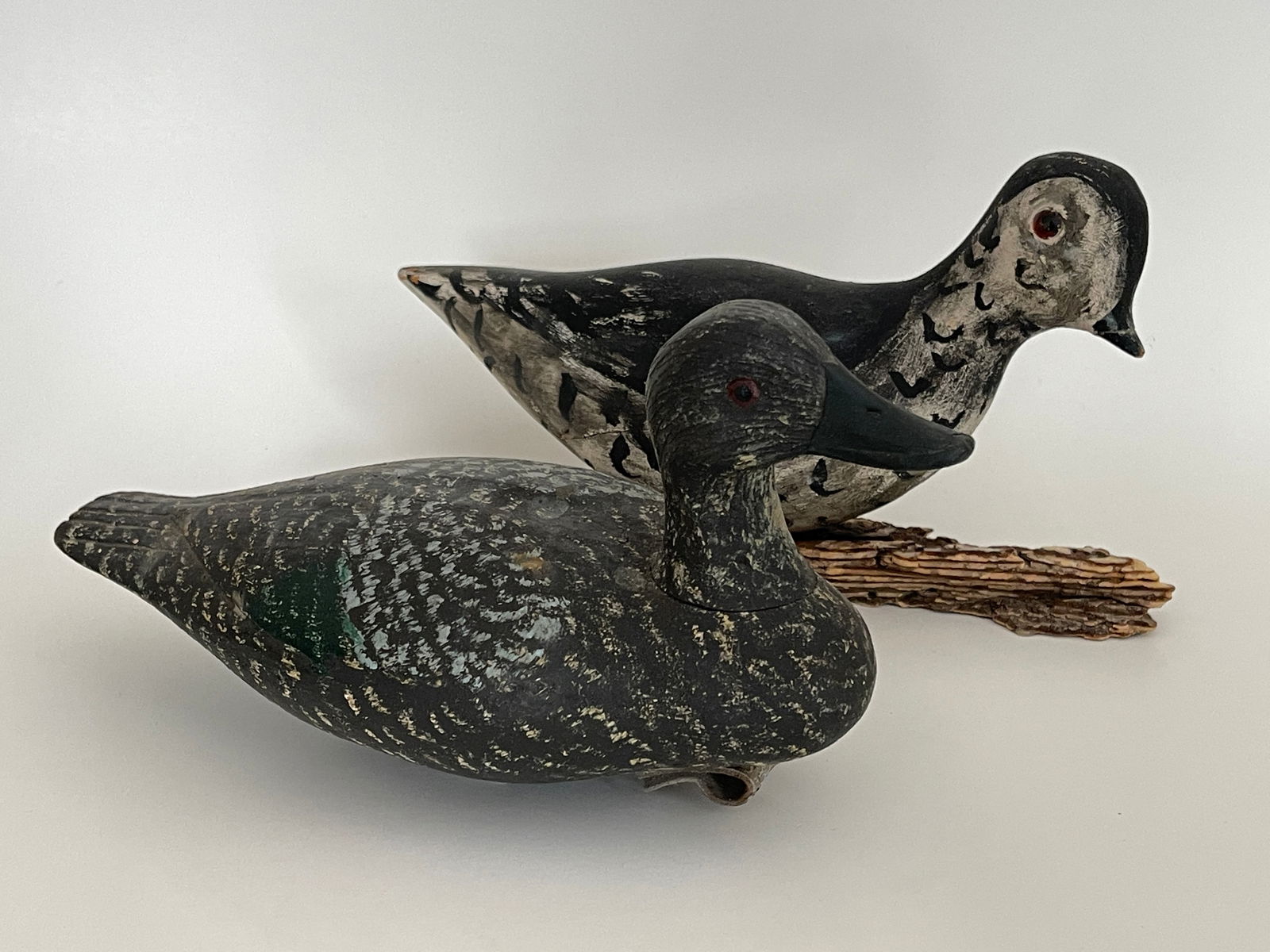TWO PAINTED AND CARVED BIRDS, ONE AN EARLY WORKING DECOY (1 of 3)