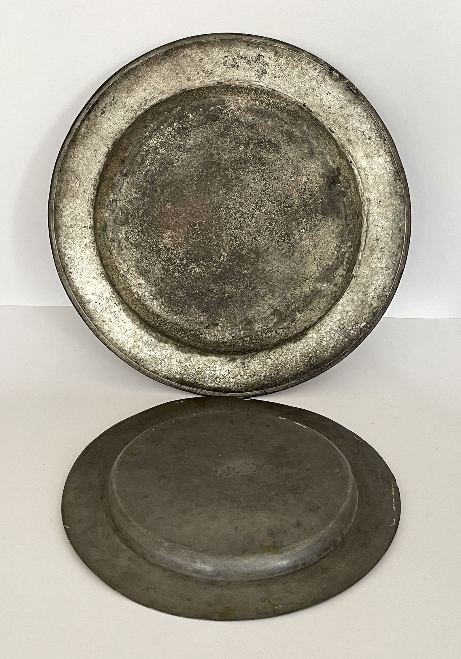 TWO PEWTER CHARGERS - 2