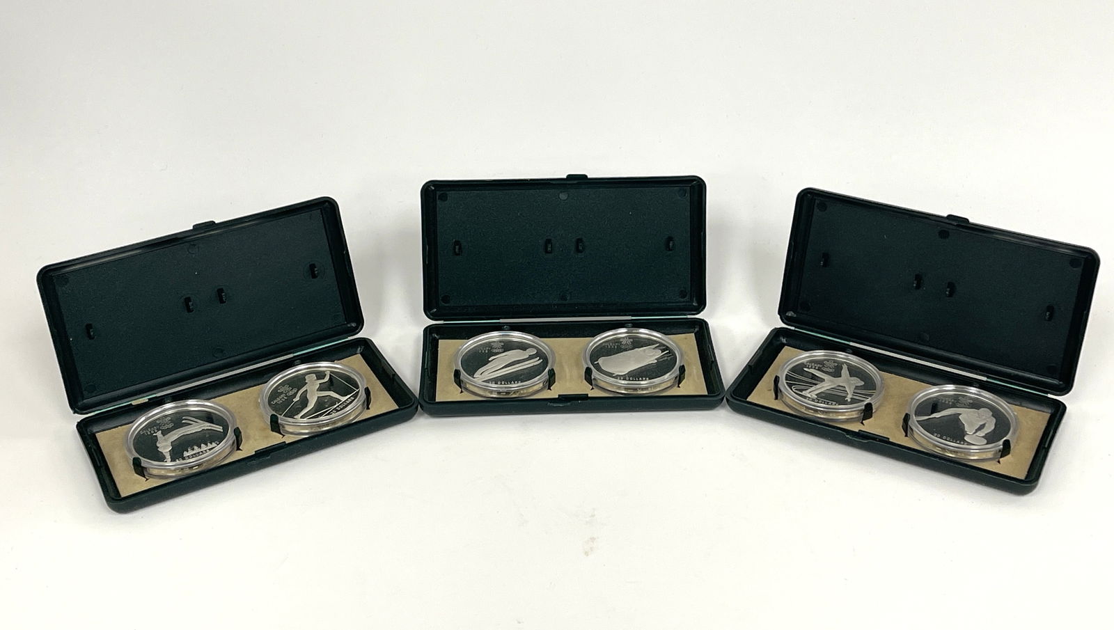 SIX 1988 CALGARY GAMES SILVER COINS: SIX 1988 CALGARY GAMES SILVER COINS