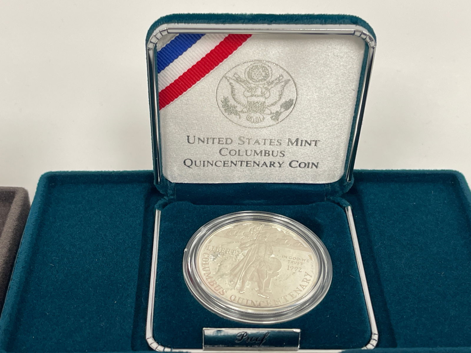 FOUR UNCIRCULATED SILVER COINS - 4