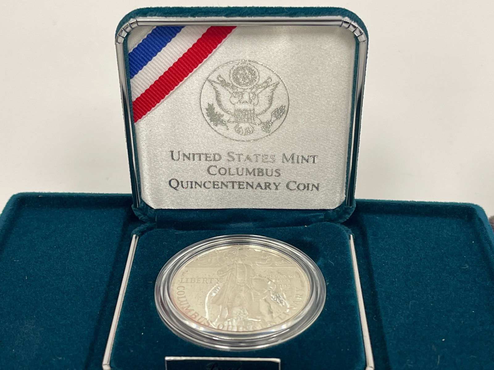 FOUR UNCIRCULATED SILVER COINS - 5