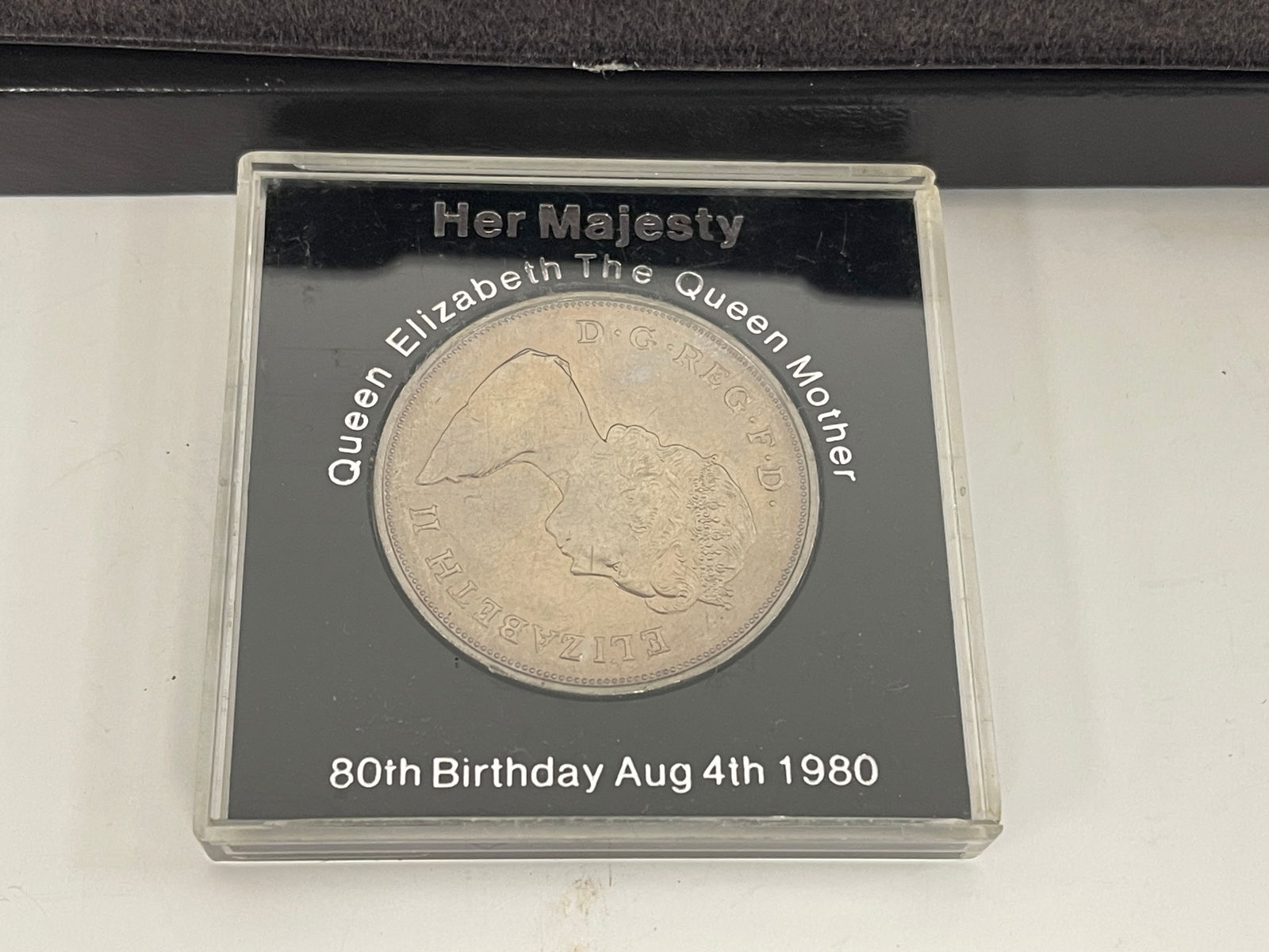 FOUR UNCIRCULATED SILVER COINS - 6