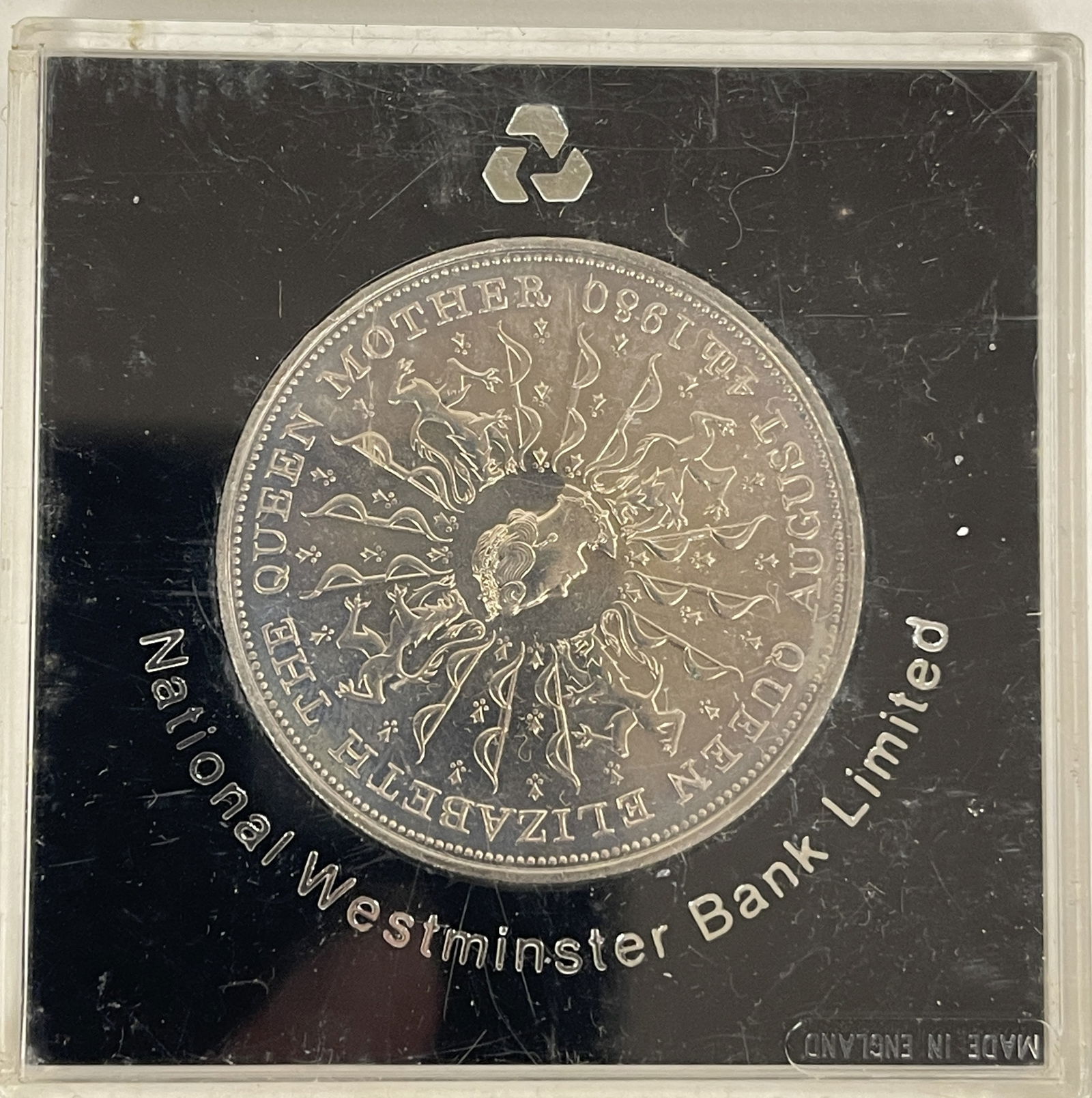 FOUR UNCIRCULATED SILVER COINS - 7