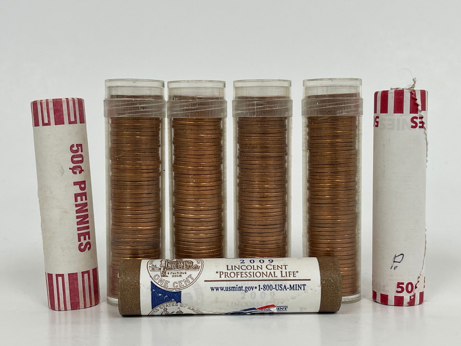 SEVEN ROLLS OF UNCIRCULATED PENNIES: SEVEN ROLLS OF UNCIRCULATED PENNIES