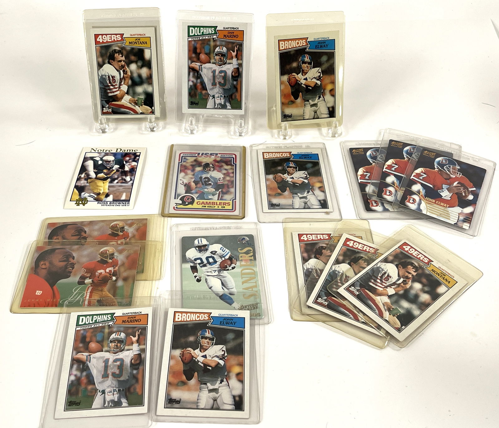 GROUPING OF FOOTBALL TRADING CARDS: GROUPING OF FOOTBALL TRADING CARDS TO INCLUDE JOHN ELWAY, DAN MARINO, OTHERS