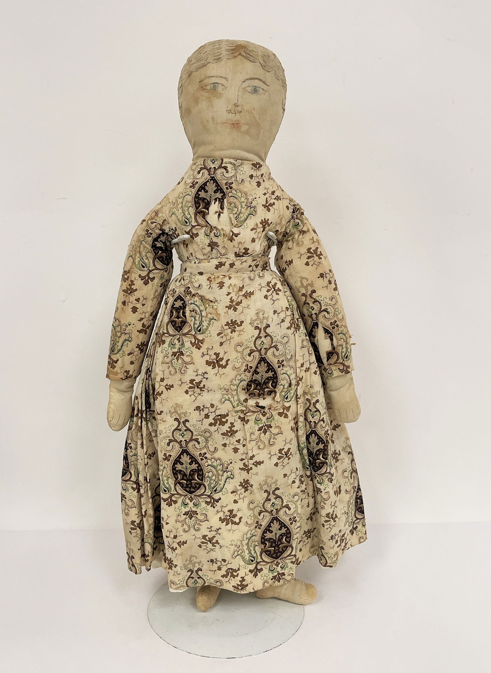 FOLK ART DOLL: FOLK ART DOLL Painted face, fabric stuffed, BROWN AND TAN DRESS,original clothing, early 20th C.
