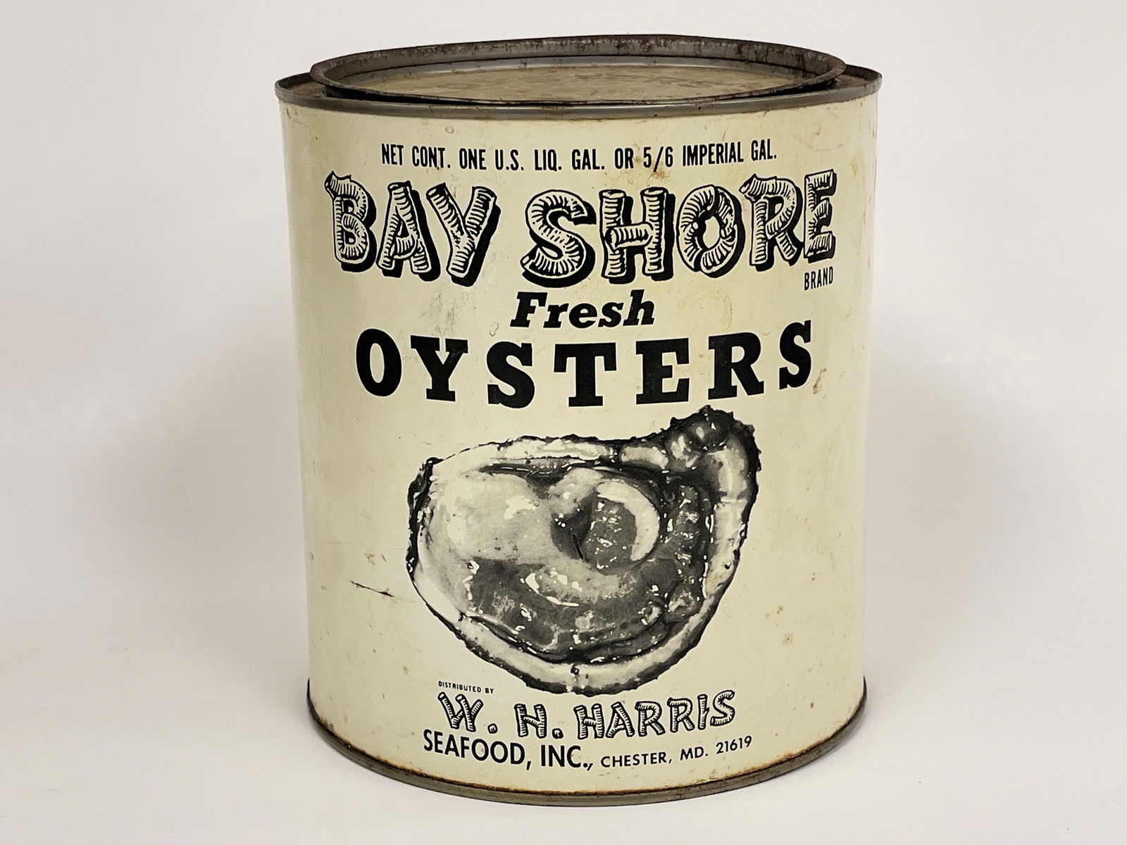 OYSTERS TIN: OYSTERS TIN WH HARRIS SEAFOOD, INC, Chester, MD, early 20th C, fine condition.