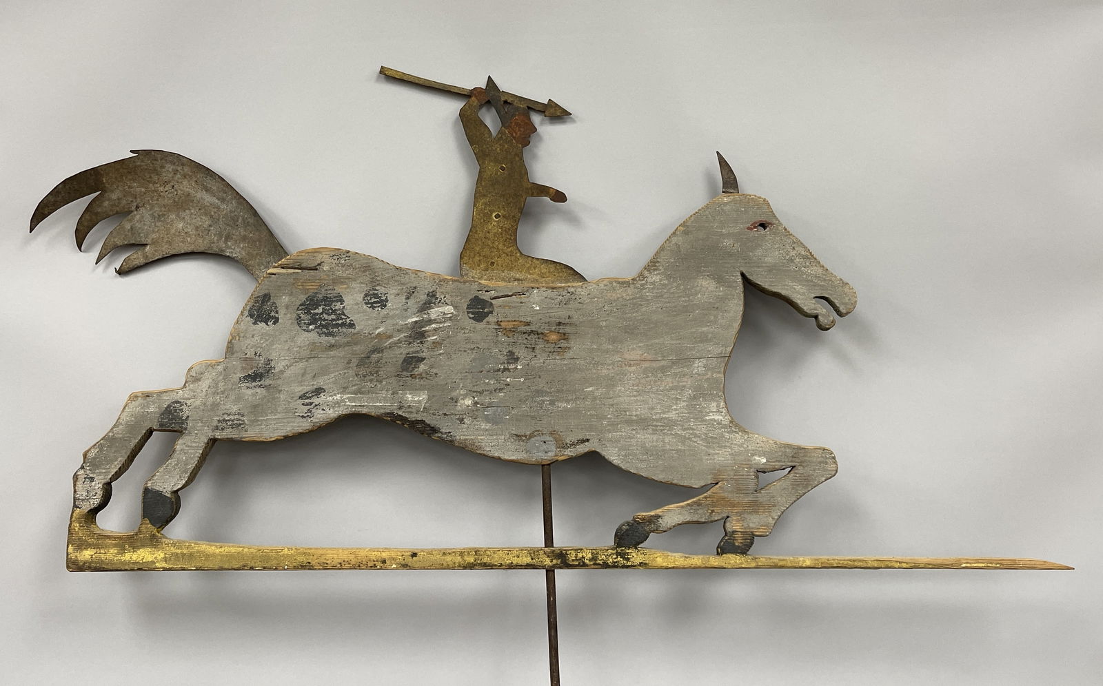 INDIAN ON HORSE VANE: INDIAN ON HORSE VANE Weathered original paint, wood & tin, C 1900-20, excellent condition.