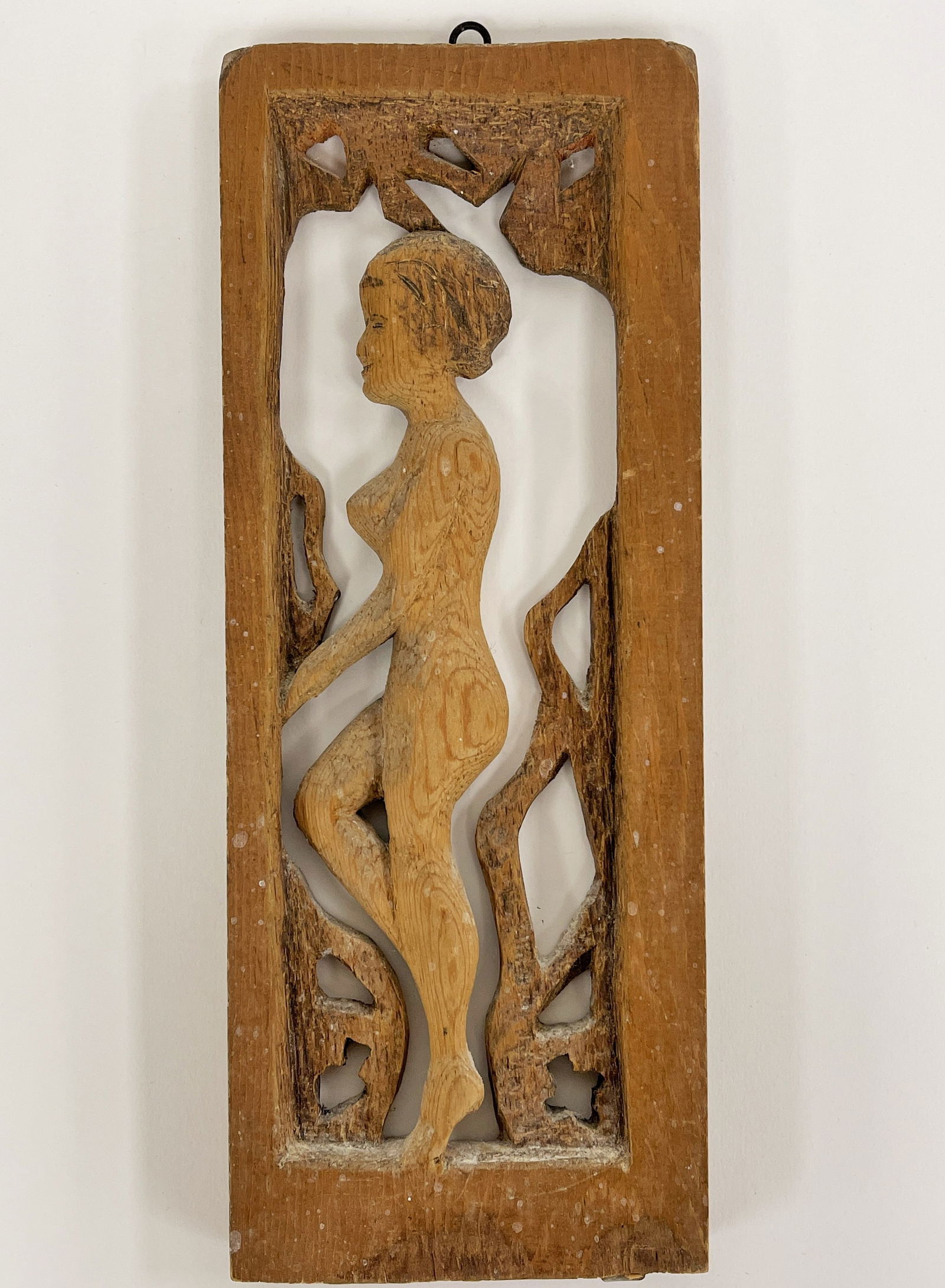 CARVED NUDE PLAQUE: CARVED NUDE PLAQUE Pine, single piece carving with framed fretwork, original surfaces, C 1900, excellent condition.