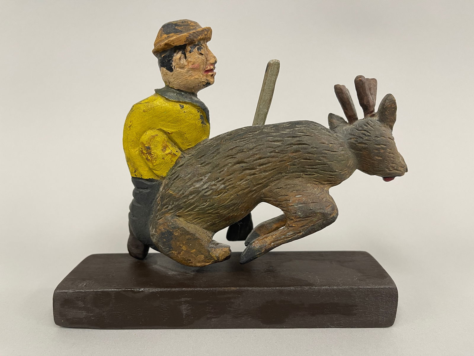 CARVED HUNTER WITH DEER - 2