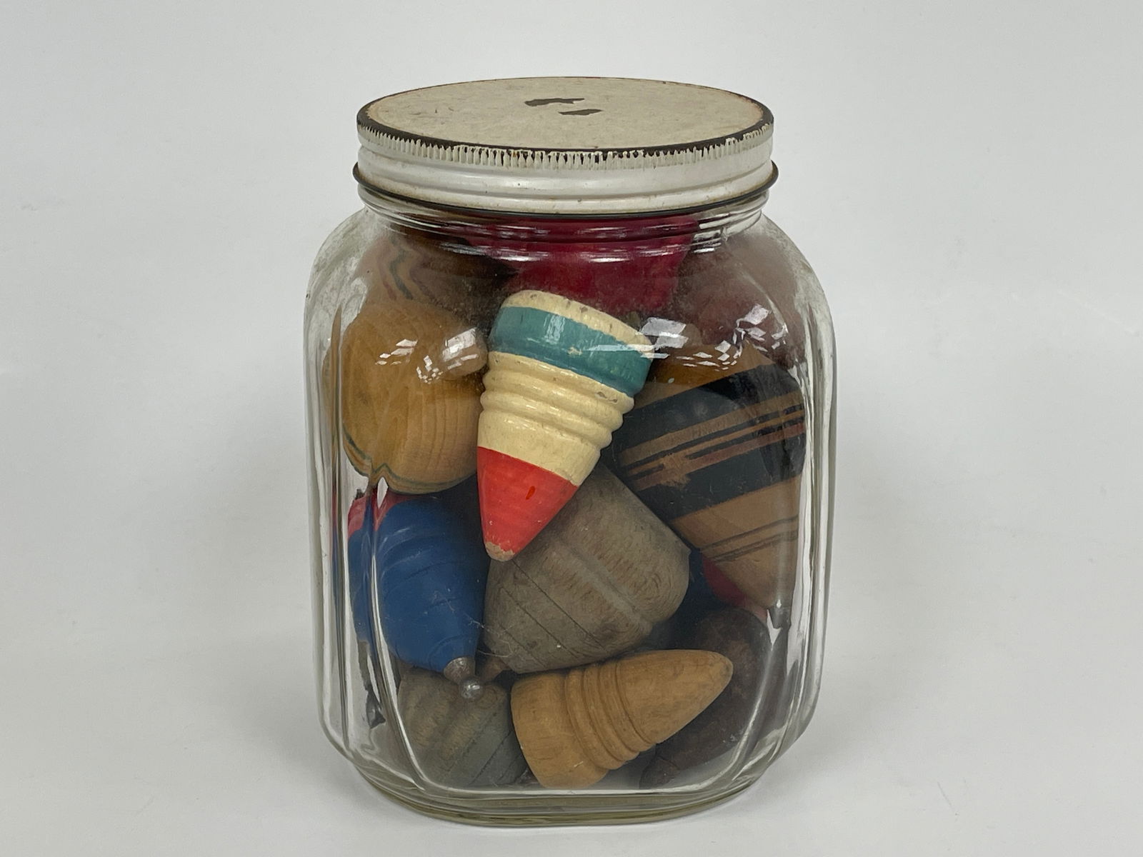 JAR OF FISHING BOBBERS: JAR OF FISHING BOBBERS Original surfaces, wood & metal, early 20th C, excellent condition.