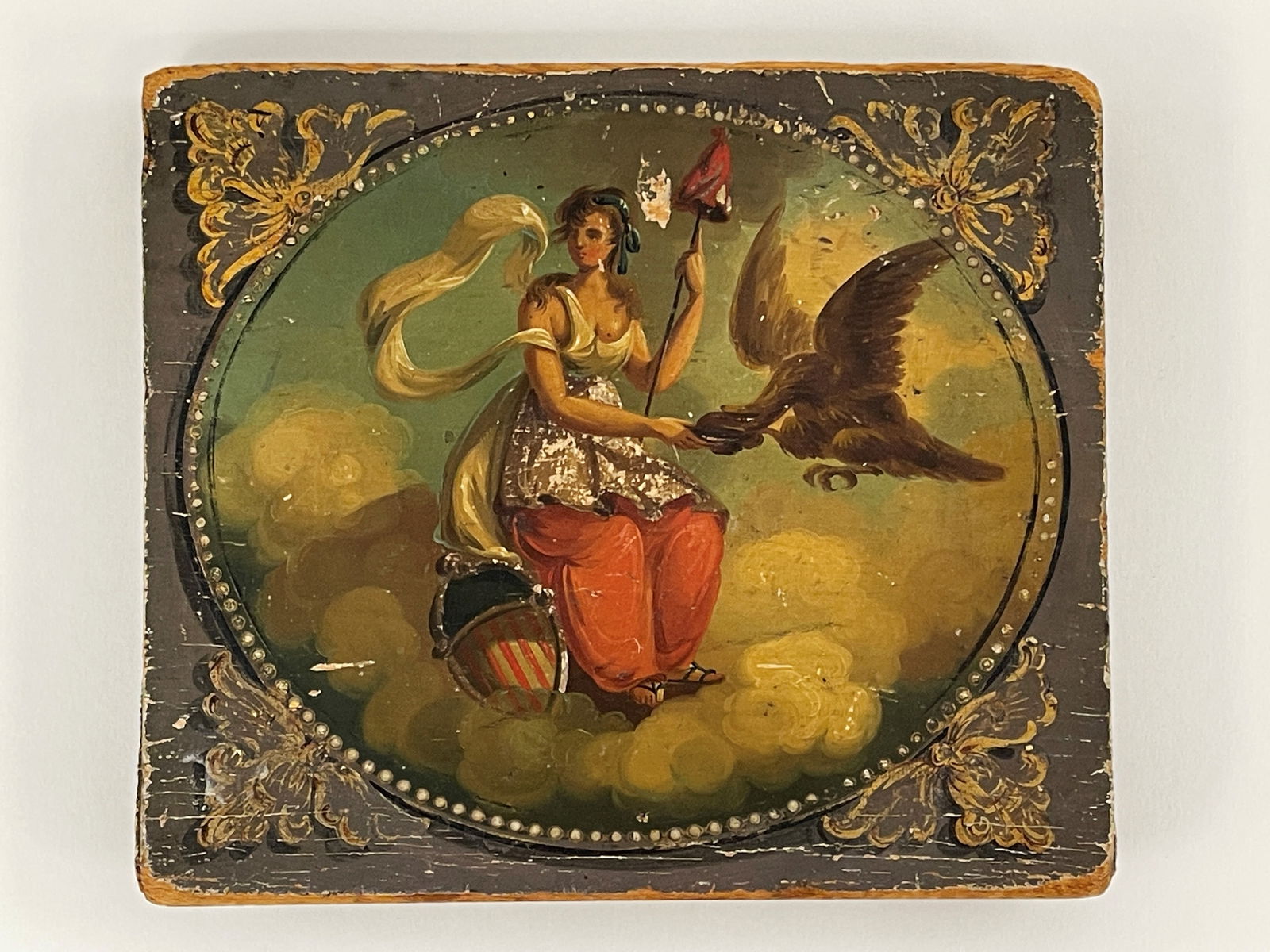 IMPORTANT FIRE WAGON PLAQUE: IMPORTANT FIRE WAGON PLAQUE Original paint on pine, rosehead nailed backside, late 18th C, reputedly from an early New England Fire Wagon, untouched original condition.