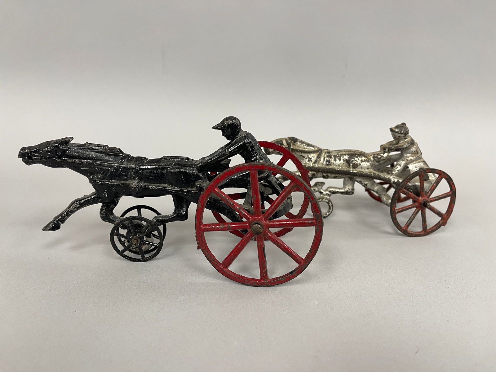 RACEHORSE WITH JOCKEY TOYS: RACEHORSE WITH JOCKEY TOYS Original paint, cast metal, late 19th C, excellent condition.