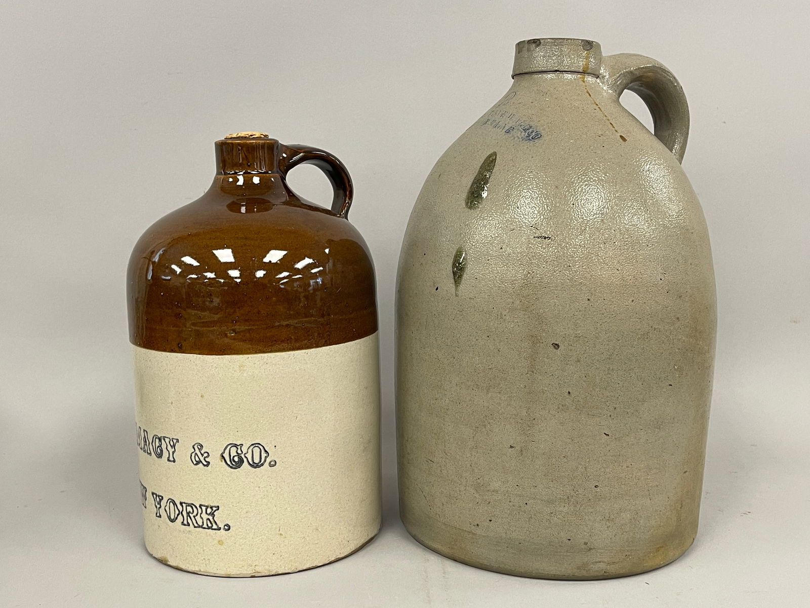 TWO HANDLED STONEWARE JUGS - 2