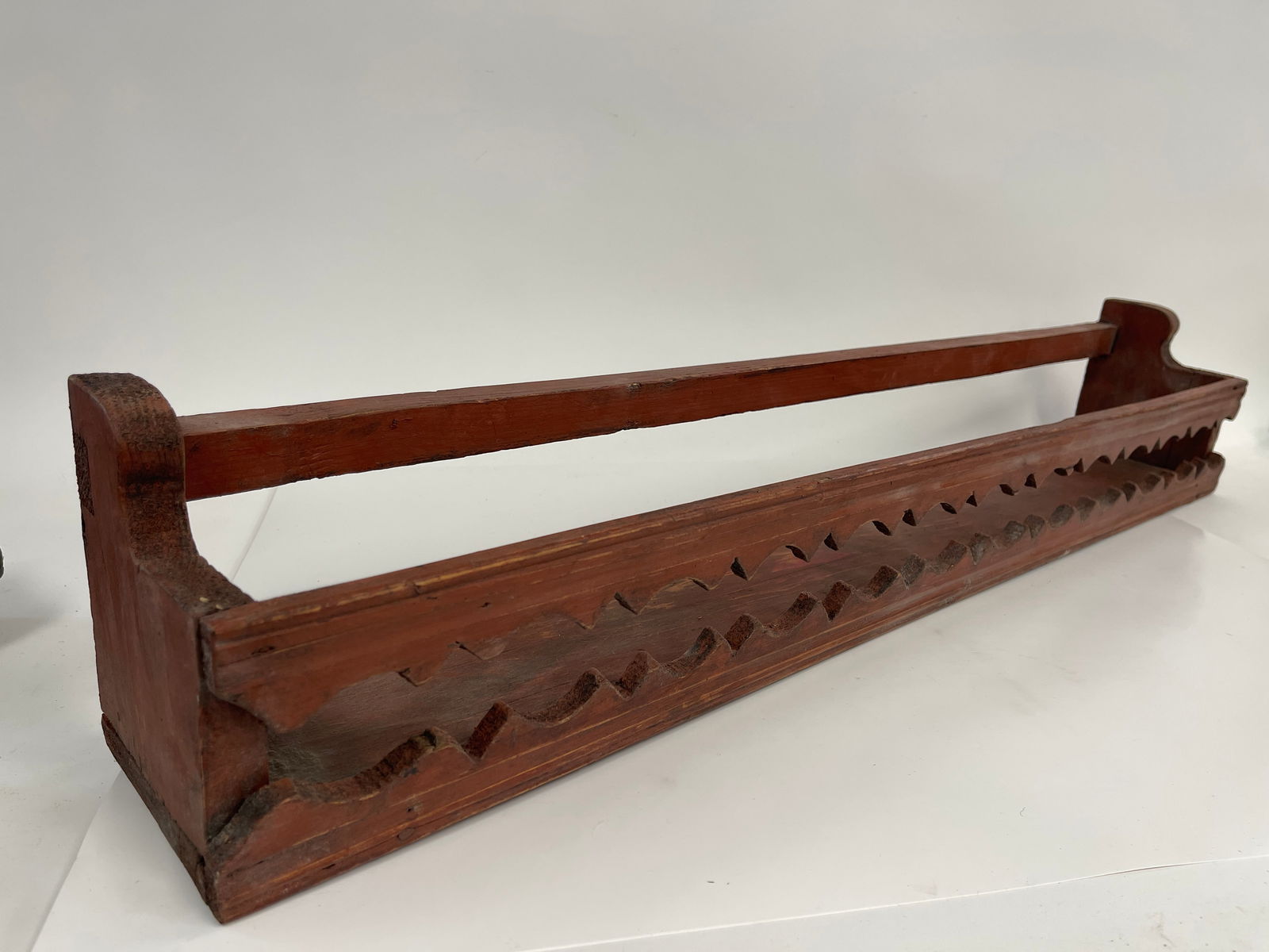 A VERY UNUSUAL HANGING SHELF W/ FANCY CUTOUT DECORATIONS IN COUNTRY RED (1 of 4)