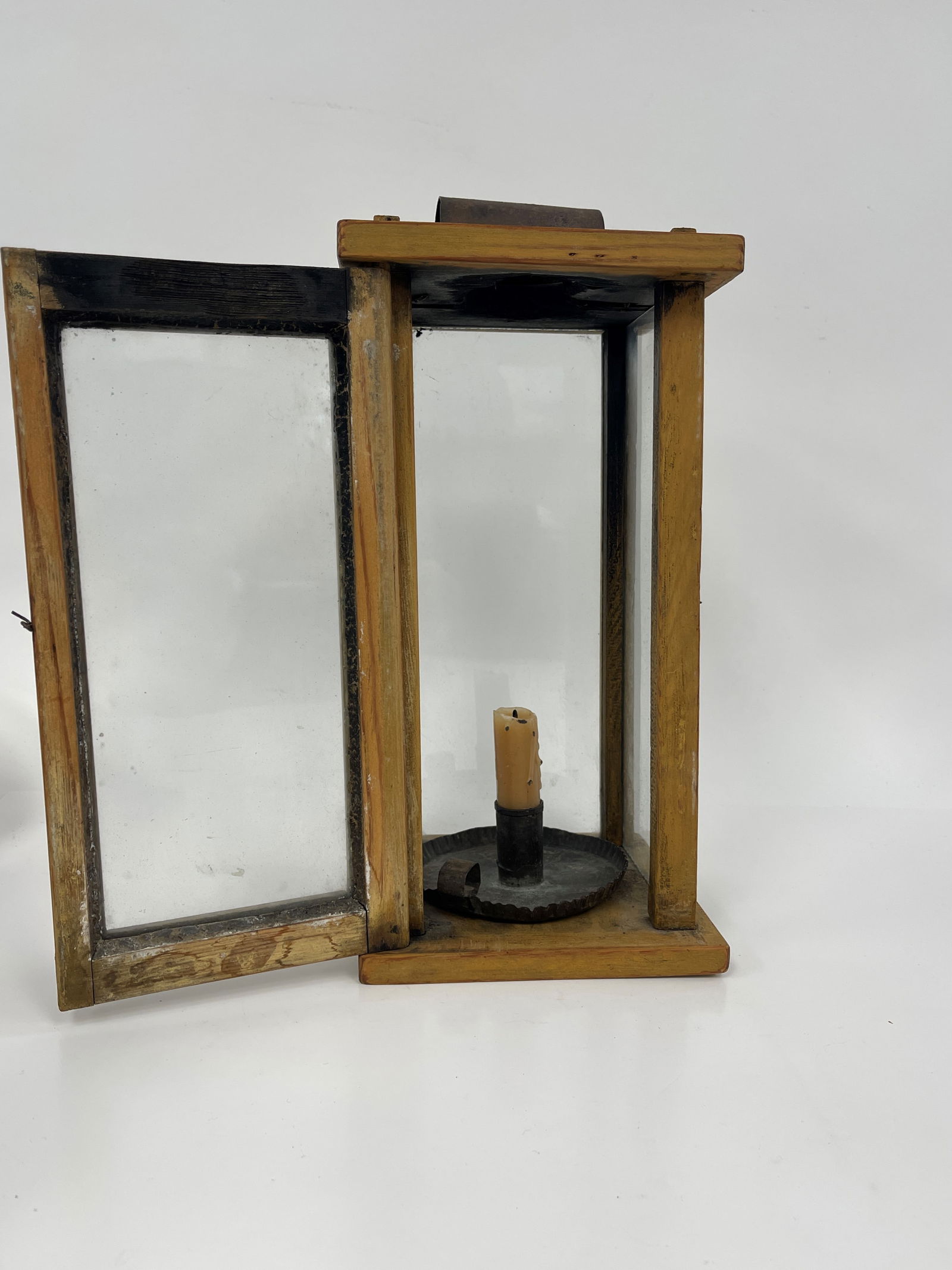 YELLOW BARN LANTERN STAMPED OB , OB ,OB: YELLOW PAINTED BARN LANTERN STAMPED OB , OB ,OB, OG GLASS MORTISE AND TENON JOINTS BLACK PAINTED SHEET IRON CHAMBERSTICK WITHIN