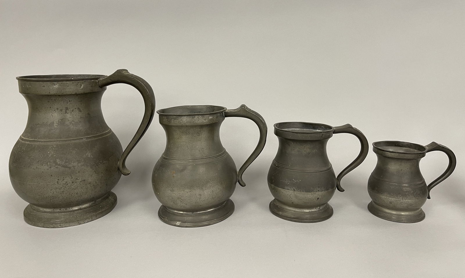 4 BULBOUS SHAPED HUGE EARLY PEWTER MEASURES; GALLON, HALF, QUART, PINT (1 of 4)