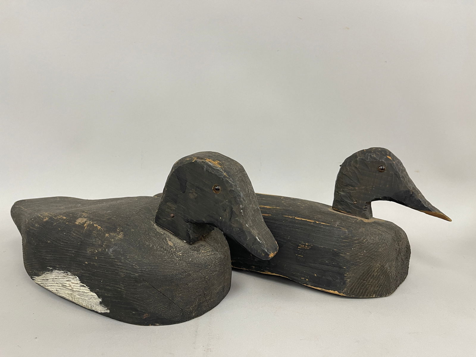 TWO PAINTED DECOYS: TWO PAINTED DECOYS, HAND PAINTED, 13 X 6 , 14 X 7