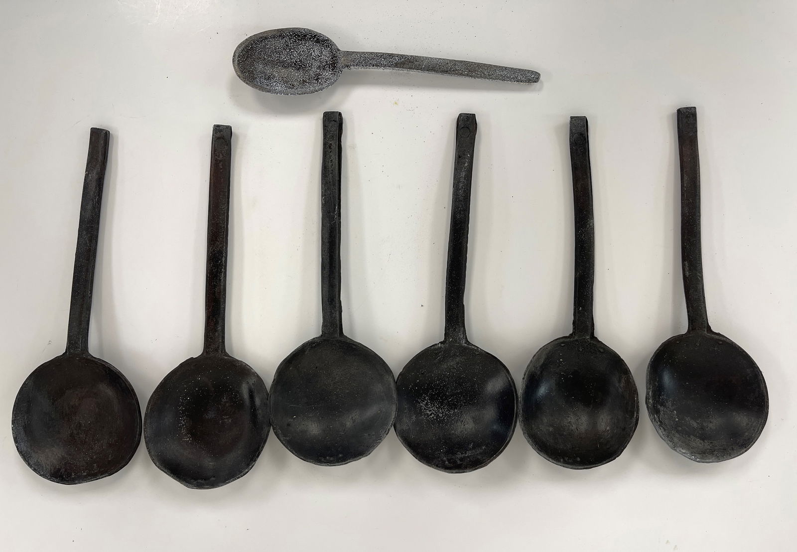 set of 17th c latten type round bowl pewter spoons (1 of 2)