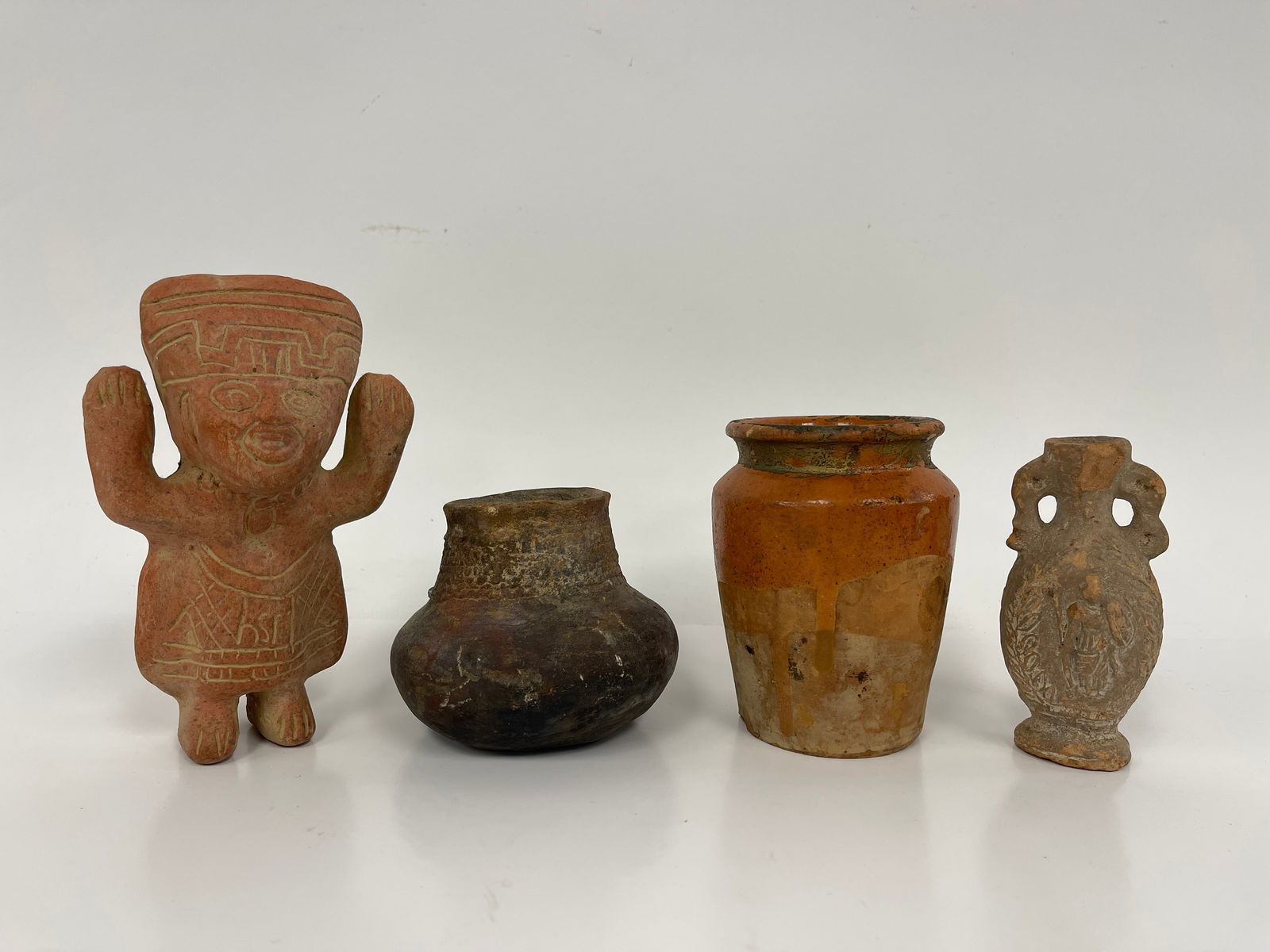 GROUPING OF FOUR EARLY REDWARE ITEMS: GROUPING OF FOUR EARLY REDWARE ITEMS