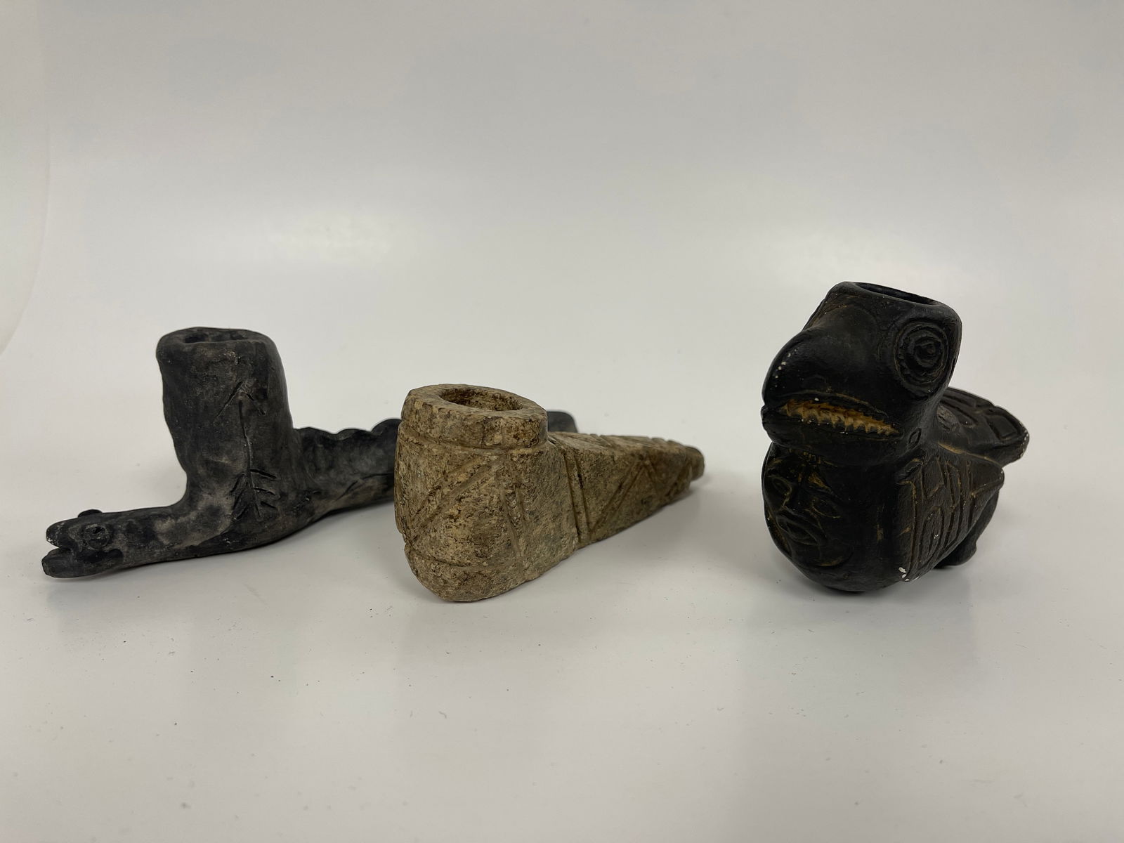 THREE NATIVE AMERICAN STONE PIPES: THREE NATIVE AMERICAN STONE PIPES