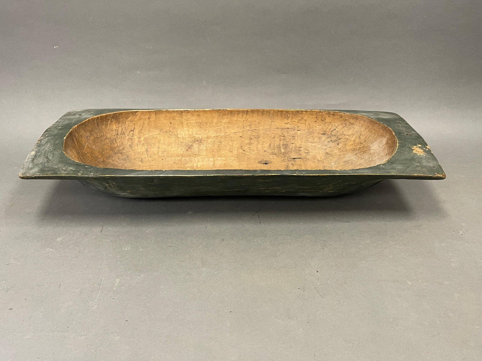 LARGE PAINTED TRENCHER EARLY TO MID 19TH C: LARGE PAINTED TRENCHER CARVED MAPLE TRENCHER, EARLY TO MID 19TH C, DRY ORIGINAL WINDSOR GREEN PAINT. EXCELLENT CONDITION. 39 X 15 X 7
