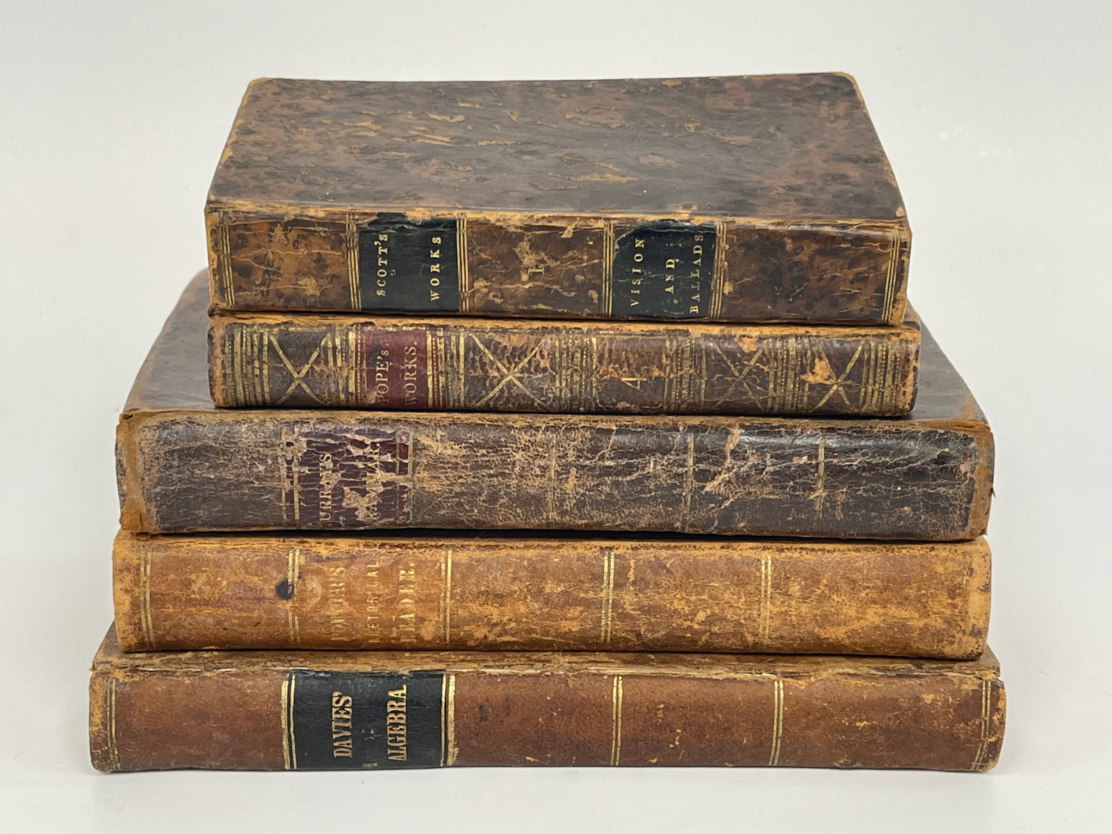 FIVE 19TH C LEATHER BOOKS: FIVE 19TH C LEATHER BOOKS (1868 GREEK TESTAMENT,1834 BYRON, 1817 WORKS OF A CHRISTIAN,1809 WOOD ENGLISH GRAMMAR, 1831 JUSTICE OF PEACE