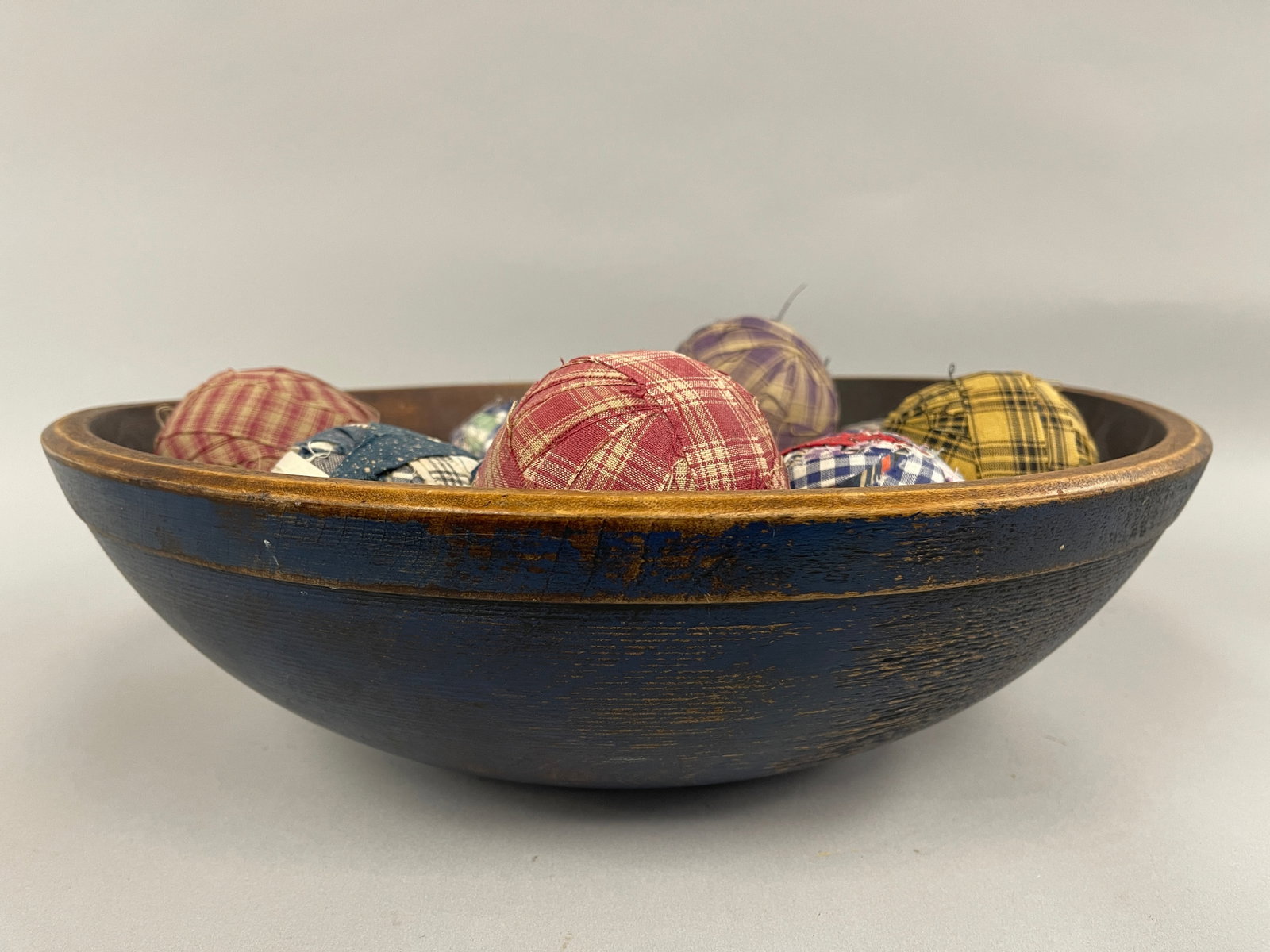 BLUE PAINTED BOWL WITH TEXTILE BALLS: BLUE PAINTED BOWL WITH TEXTILE BALLS 17" X 5"