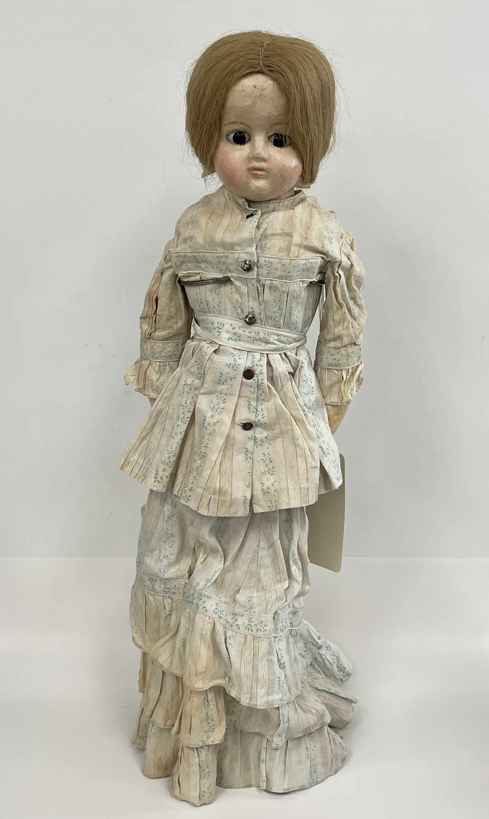 C1830-40 BEAUTIFUL WAX OVER PAPIER-MÂCHÉ DOLL: C1830-40 BEAUTIFUL 23” WAX OVER PAPIER-MÂCHÉ DOLL WITH PUPIL LESS GLASS EYES. SOME LOSS AND REPAINT ON HER FACE. SHE HAS A BREAK AT THE BACK OF HER SHOULDER PLATE AND A VERY NICE BUT FRAGILE