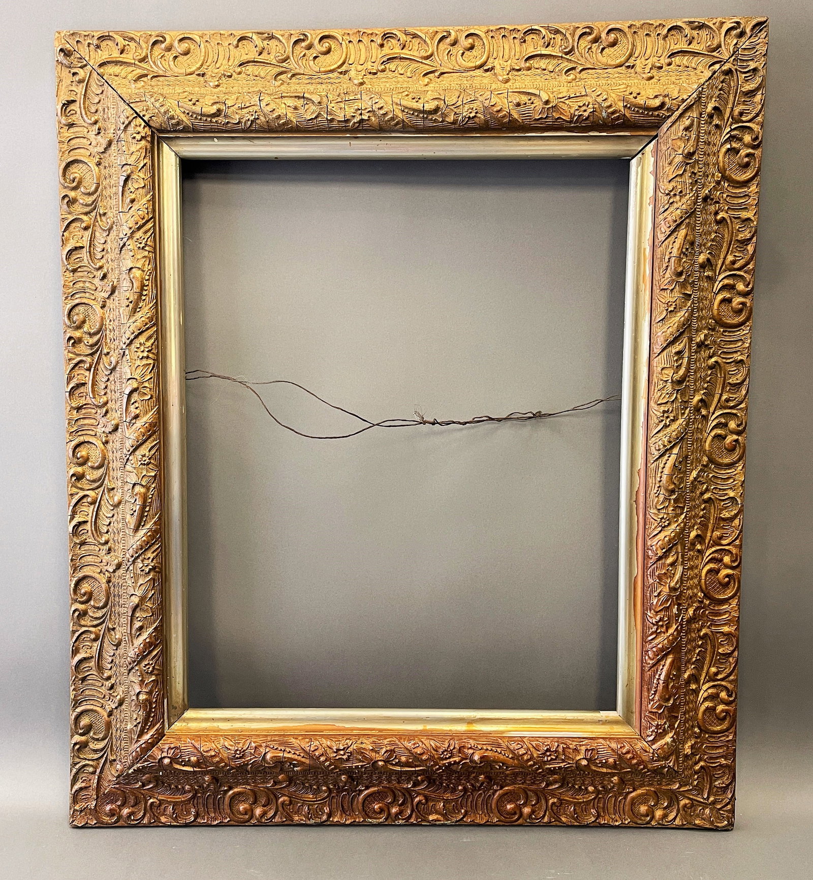 19TH CENTURY GOLD LEAF FRAME: 19TH CENTURY GOLD LEAF FRAME WITH LINER. FITS 16” X 20” ARTWORK. OVERALL FRAME SIZE: 42” 24 ½” X 28 ½”.DS20TH