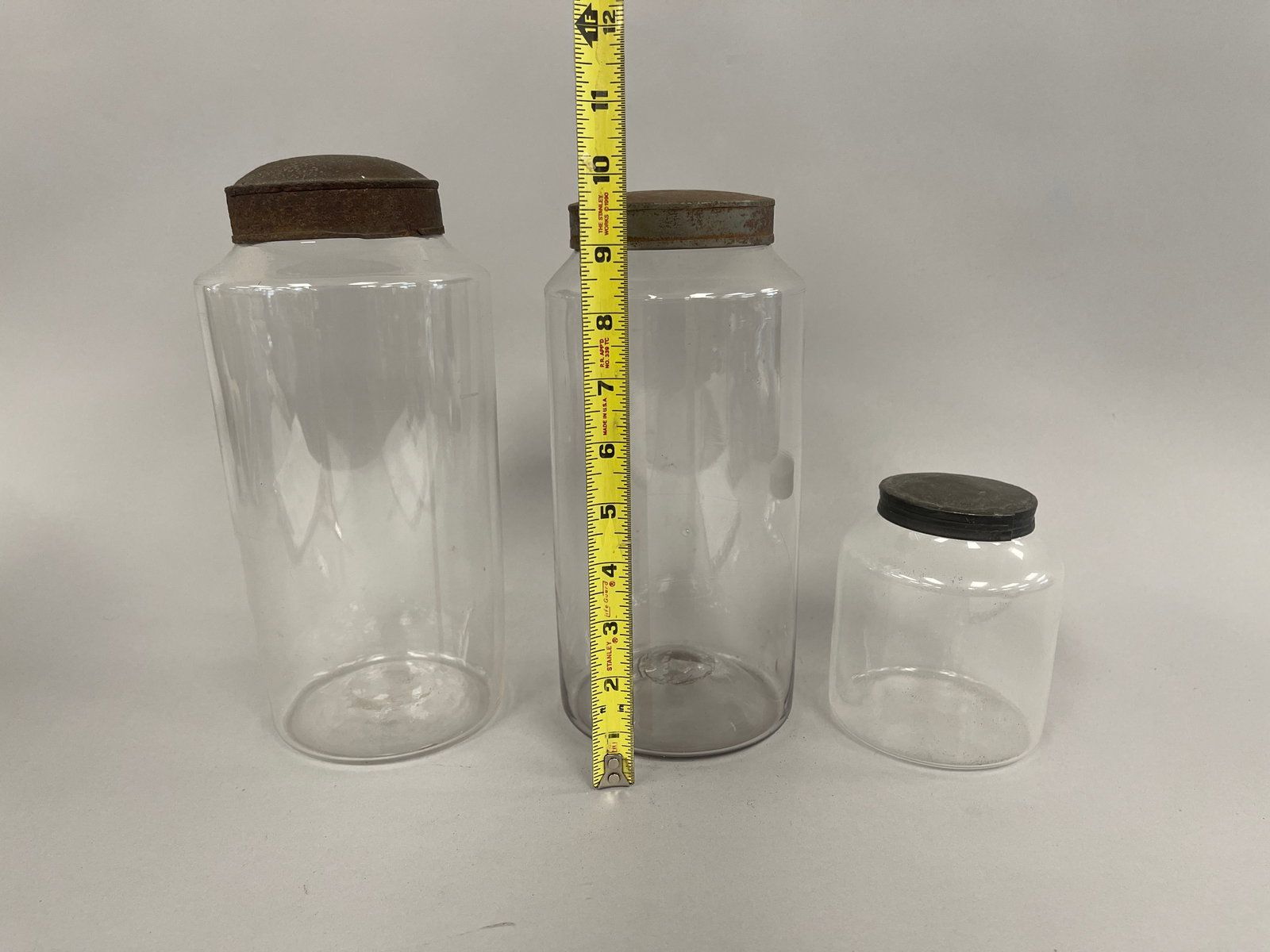 THREE GLASS APOTHECARY JARS - 2