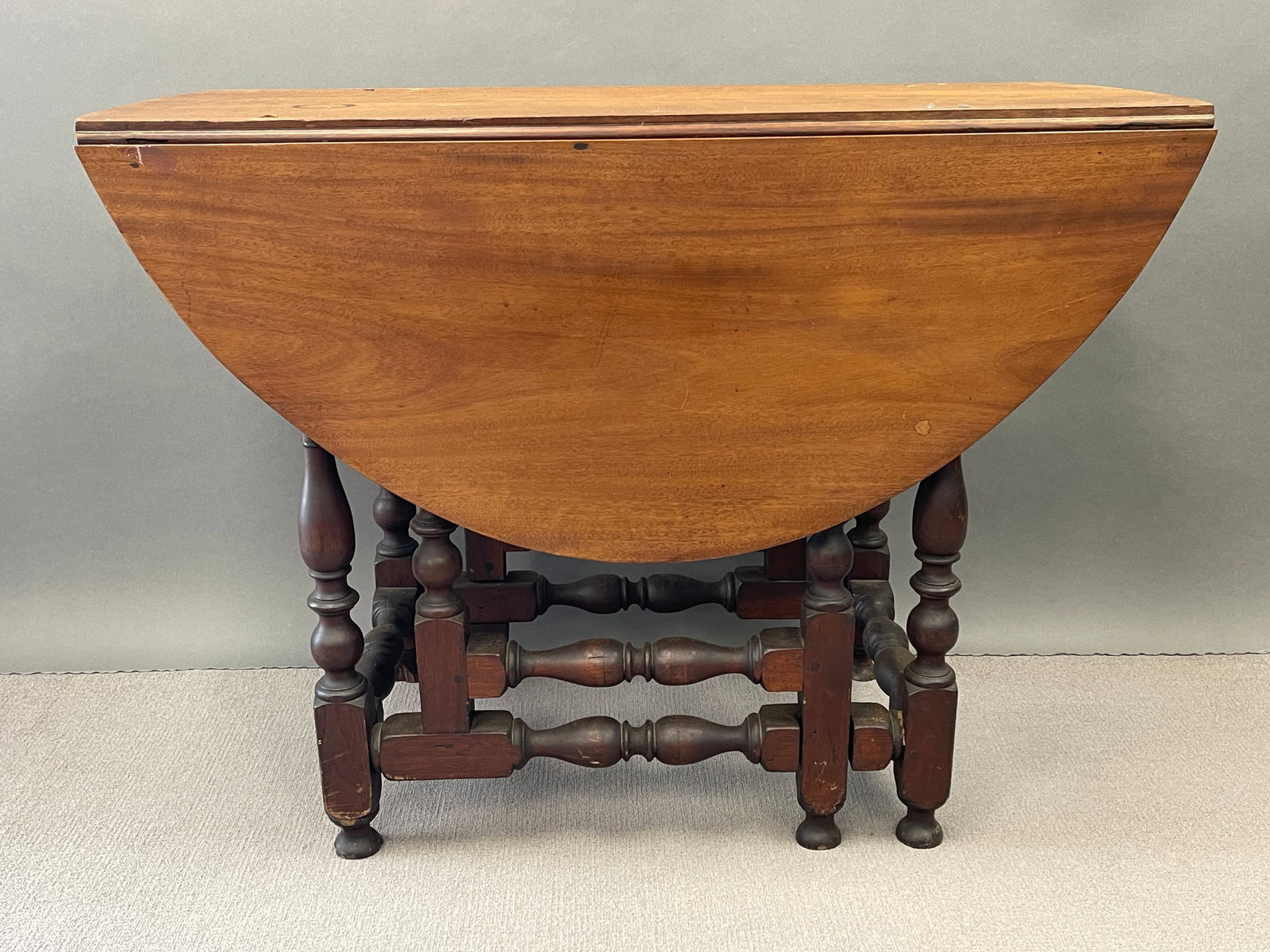 BOLDLY TURNED WALNUT GATELEG TABLE (1 of 9)